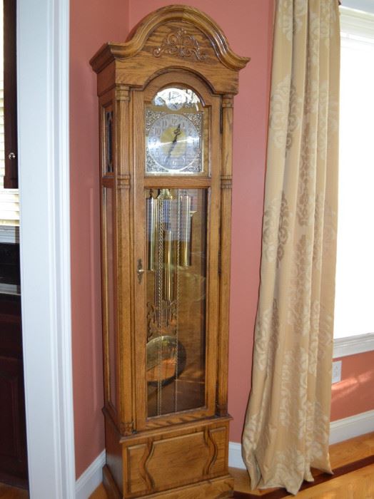 Howard Miller grandmother clock with oak case