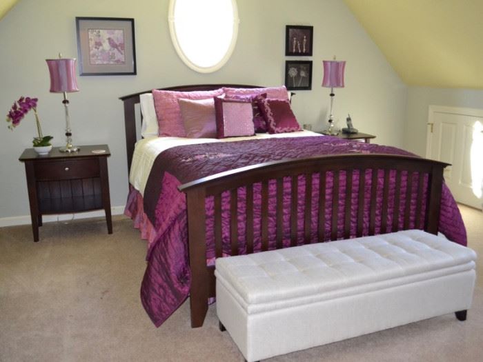 Queen bed and matching nightstands with upholstered storage ottoman