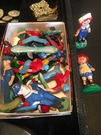 Plastic soldiers, football players, raggedy Ann & Andy cake toppers