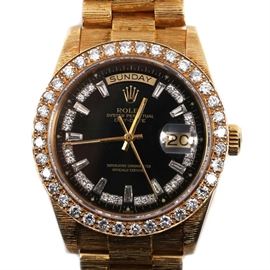 Rolex Oyster Perpetual Day-Date 18K Yellow Gold and 2.72 CTW Diamond Wristwatch: A Rolex Oyster Perpetual Day-Date 18K yellow gold and diamond wristwatch.