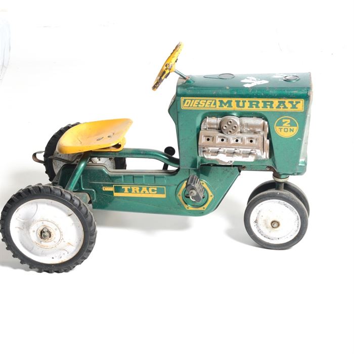 "Diesel Murray" Riding Tractor: A Diesel Murray riding tractor with a yellow seat, pedals and steering wheel.