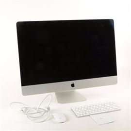iMac Monitor Computer: An Apple iMac monitor computer. Included with the computer is a keyboard, mouse, and power cable. There is no visible model or serial number on this unit.