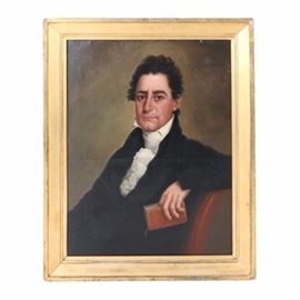 Oil Portrait Painting on Canvas of a Man: An oil portrait painting on canvas of a man. This unsigned painting depicts a gentleman in a black and white suit seated in a chair clutching a book. The painting is presented in a gold tone gesso and wood frame. A wire is present to the verso for hanging purposes.
