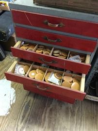 Chest full of various size pads for instruments