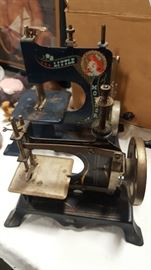 Two vintage toy sewing machines