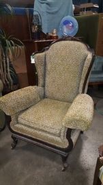 Antique comfortable wingback chair
