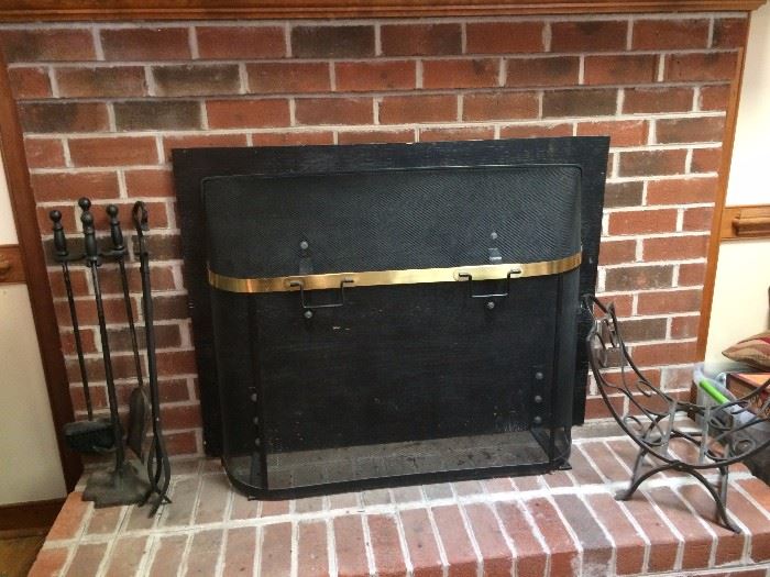Wrought iron fireplace set, log holder, and screen for sale. 