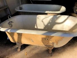 Antique cast iron claw foot bath tubs