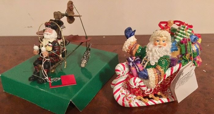 Waving and flying Santa ornaments