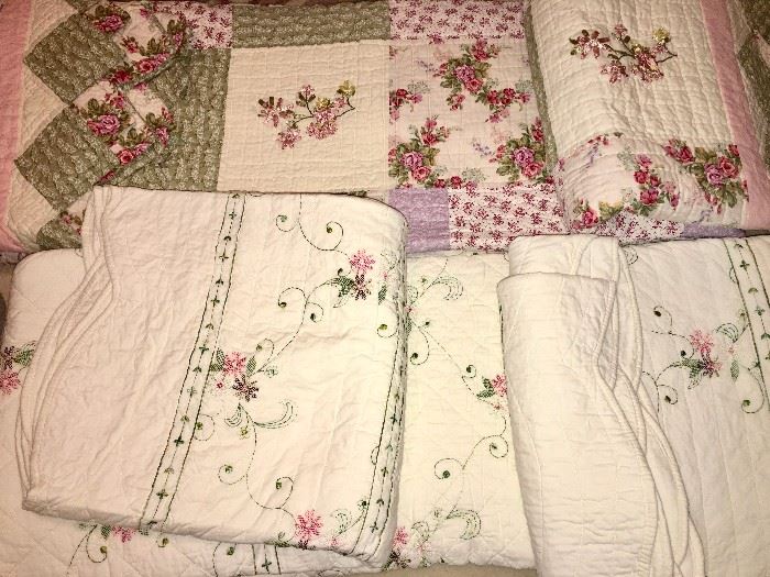 Cross-stitch and floral patchwork king quilts