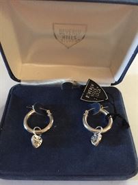 Beverly Hills Silver sterling silver hoop earrings with heart charms 