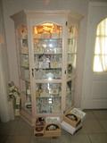Nice lighted curio cabinet