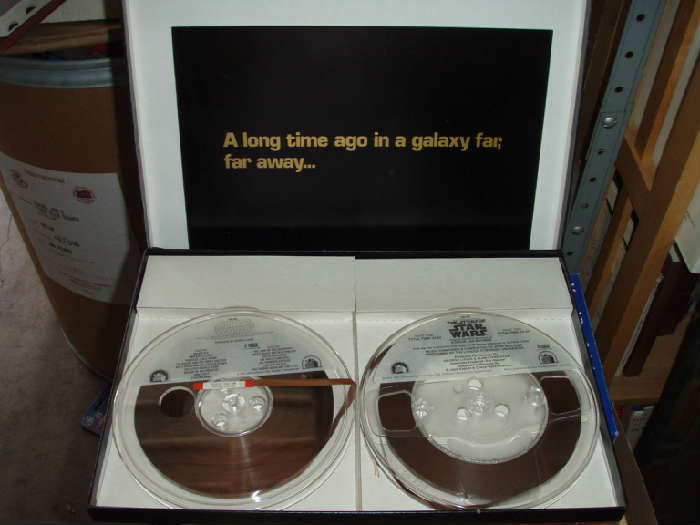 Reel #1 (RN541) is a 4-track recording of the movie's soundtrack (Sounding all John Williams-like and produced by George Lucas)

Reel #2 (RN550) is a 4-track recording entitled: "The Story of Star Wars" ("Original cast with narration by Roscoe Lee Brown") Part 1 = 24:53 / Part 2 = 24:59 (time)

Includes near mint 16 page full color booklet.   No bends, no crinkles, no tears!

All is beautifully presented in an excellent condition box. No crushed or ripped corners. Box is 14" x 10".