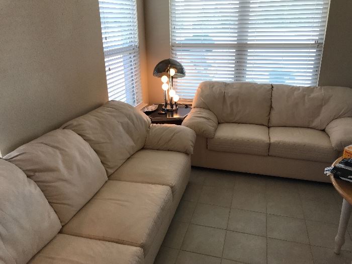 Cream leather sofa and love seat