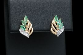 14K Yellow Gold, Emerald and Diamond Drop Earrings: A pair of 14K yellow gold, emerald and diamond drop earrings.