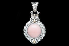 Sterling Silver, 18K Yellow Gold and Pink Opal Pendant: A sterling silver, 18K yellow gold and pink opal pendant.
