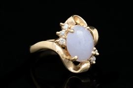 14K Yellow Gold, Purple Jadeite and Diamond Ring: A 14K yellow gold, purple jadeite and diamond ring.
