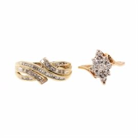 Set of 10K Yellow Gold Diamond Rings: A set of 10K yellow gold diamond rings. This set includes a cluster ring featuring nine single cut diamonds clustered on a bypass band. The set also includes a ring showcasing criss-crossing bands of channel set baguette and single cut diamonds.