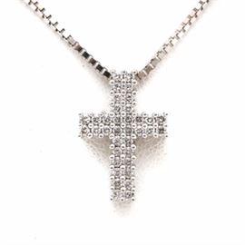 14K White Gold Diamond Cross Pendant on Aurafin Chain: A 14K white gold 0.50 ctw diamond cross pendant on a Aurafin chain. This necklace features a diamond cross slide pendant affixed to a Aurafin box link chain.