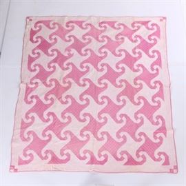 "Virginia Reel" Hand Stitched Quilt: A hand pieced and hand quilted pink and pale pink “Virginia Reel” quilt. The front part of the quilt is pale pink and a rose pink with the backing a solid rose pink.