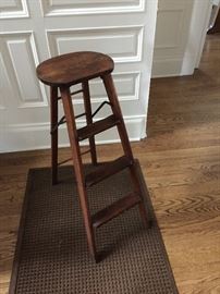 Antique folding stool, with wrought iron hinges.
