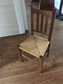 Mission chair with woven rush seat.