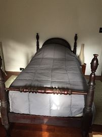 Antique twin bed; dissambles easily.