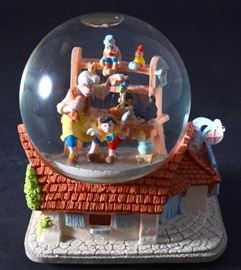Lot 34: Pinocchio Snow Globe & Music Box