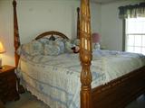 Four poster king size bed
