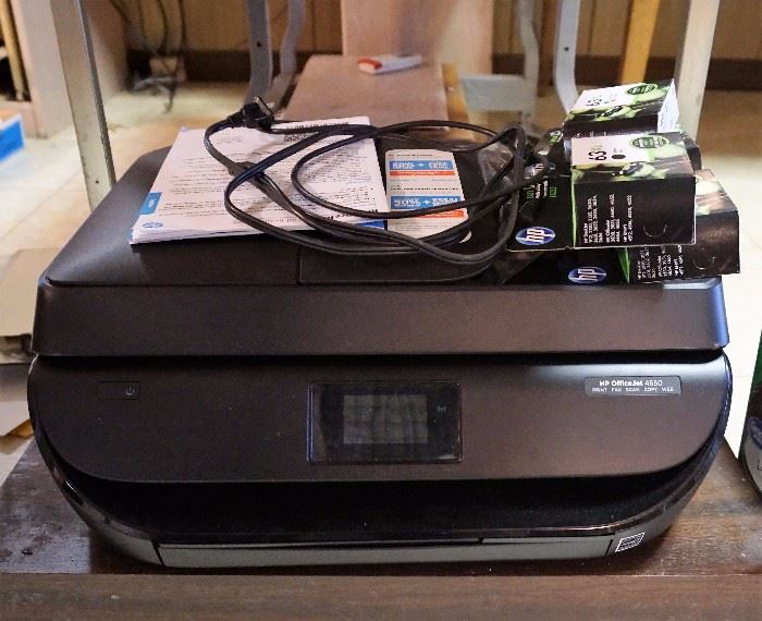 HP printer and several cartridges