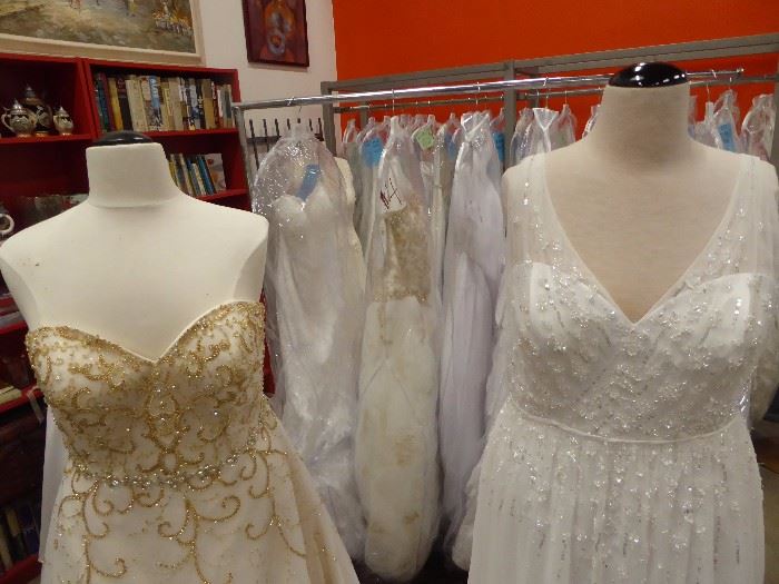 75% OFF all new wedding gowns! Gowns by Alfred Angelo - sizes 6 to 26 NEW with tags