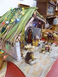 Hand made stable with nativity scene.