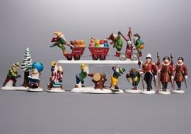 Offered is a lot of 4 figures sets from The Heritage Village Collection by Department 56: "Woodsmen Elves", "Yeomen Of The Guard", "Last Minute Delivery", and "Charting Santa's Course". The boxes show normal shelf wear but the porcelain is undamaged. Please see the photos at completeset.com for details.