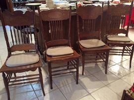 Four oak dining chairs