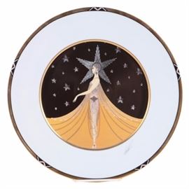 Erte Sevenarts Limited Porcelain Plate After "New York, New York": A limited edition porcelain plate by Sevenarts. This plate features a printed image after the original work New York, New York by well-listed artist Erté (Russian 1892-1990). The plate features an in-print signature to the lower right and is marked to the verso “UH 210, New York, New York, Fine China, Germany, Copyright 1990 by Sevenarts Limited.” The plate is also marked “25” to the verso.