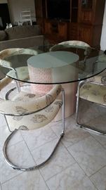 dining set for (4)...glass topped table and club chairs