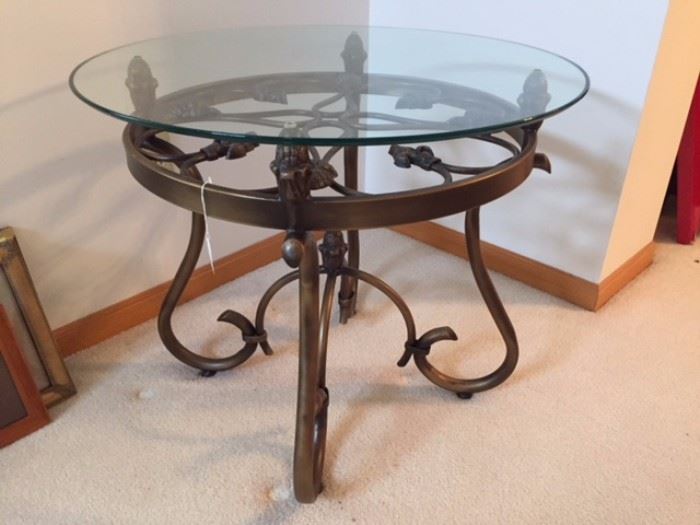 Glass Cocktail Table With Spanish Hand Wrought Iron Base, Finish is Antique Gold Medal Leaf.
