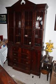 Flame mahogany breakfront china cabinet with pull out secretary with cubbies,