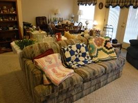 There excellent quilts that need a very little work. All priced below $100. The couch is a sleeper and FREE to the first person that shows up for it! It is in great shape.