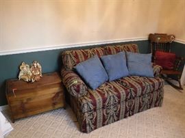 Very nice loveseat and carved rocker.