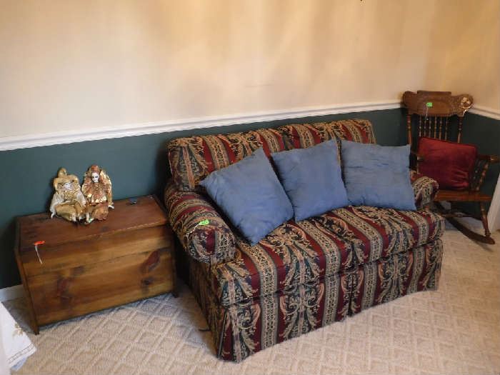 Very nice loveseat and carved rocker.