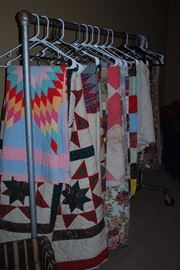 Several quilts and bedspreads