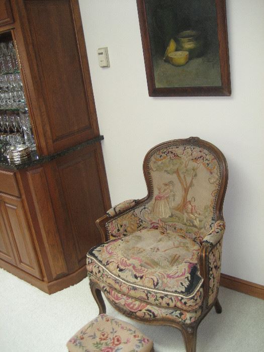 Needlepoint chair and foot stool with framed oil painting