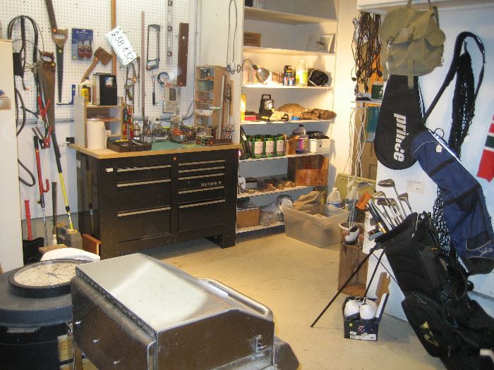 Craftsmen tool cabinet, hand tools, sports equipment (in garage)