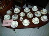 TEA CUPS AND SAUCERS