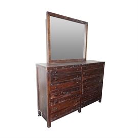 Rustic Dresser with Mirror: A rustic dresser. This dresser features a pair of shallow half-width drawers to the top over a set of six deep, half-width drawers. Each drawer features knob pulls and is on track slides. The piece rises above square legs and features a rectangular mirror to the top. This item coordinates with item: 17BOS185-218 and 17BOS185-217.