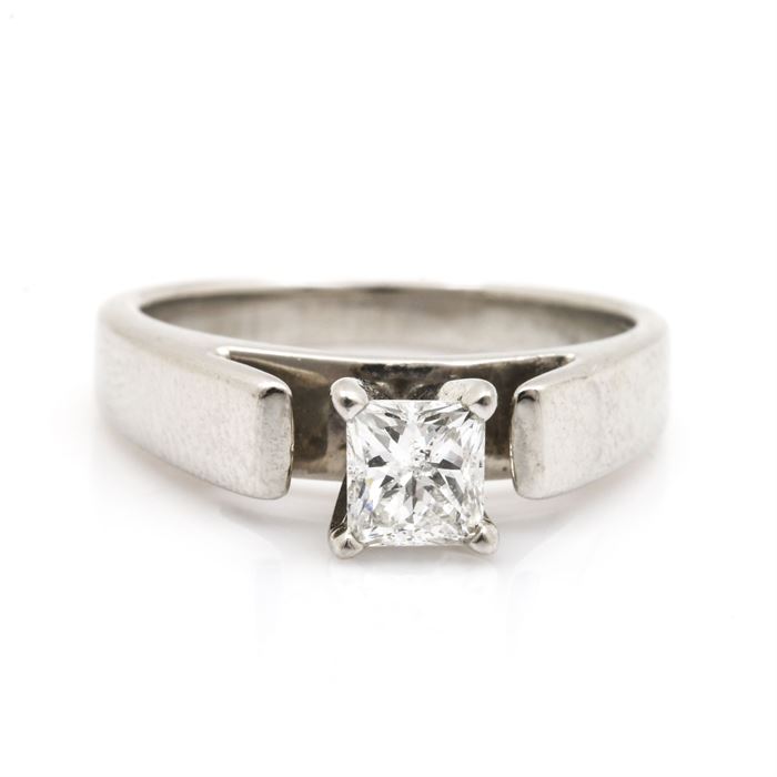 Platinum 0.50 CT Diamond Solitaire Ring: A platinum 0.50 ct diamond solitaire ring. Rising from a recessed gallery is a prong set princess cut diamond.