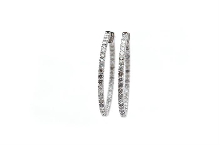 14K White Gold 2.84 CTW Diamond Inside Out Hoop Earrings: A pair of 14K white gold single band round cut inside out diamond hoop earrings.