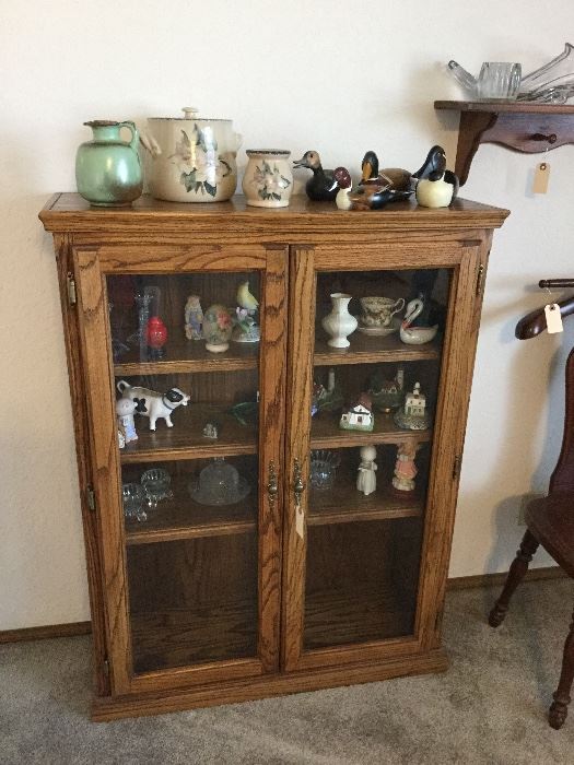 Side oak curio cabinet 