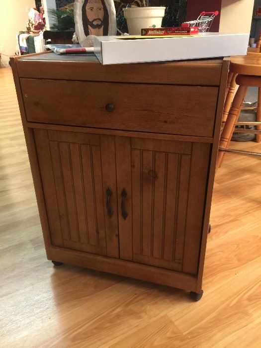 Nice little kitchen cabinet for extra storage.
